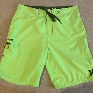 Hurley neon green board shorts, size 34